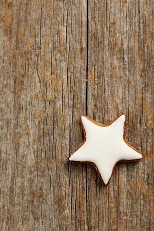 Gingerbread cookies on a grey wooden tableの写真素材