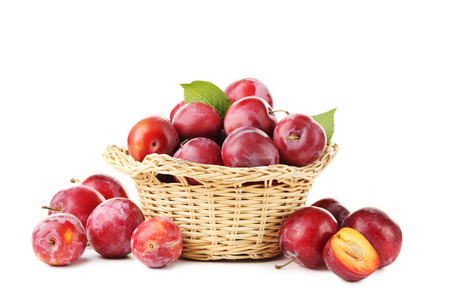 Fresh plums isolated on a whiteの写真素材
