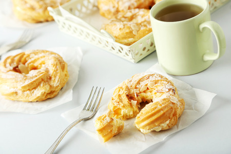 Sweet and tasty eclairs on a white backgroundの写真素材