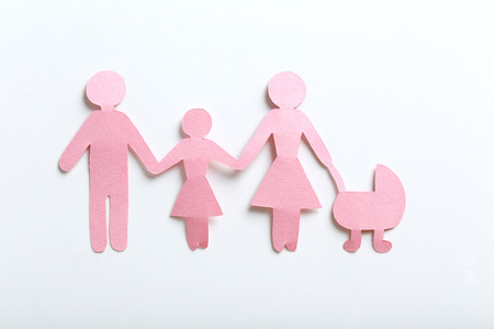 Happy paper family on white backgroundの写真素材