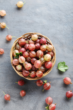Gooseberries fruit on a grey tableの写真素材
