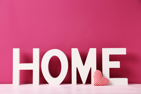 Word home of the decorative letters on wooden tableの写真素材