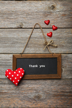 Frame with love heart  on wooden backgroundの写真素材