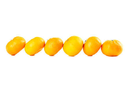 Ripe mandarins isolated on a whiteの写真素材