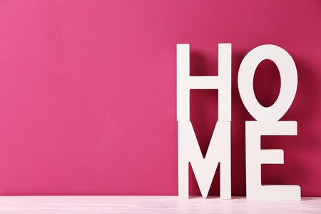 Word home of the decorative letters on wooden tableの写真素材