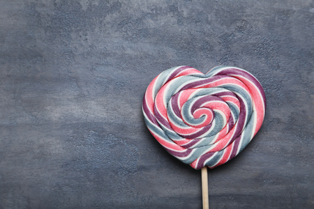 Sweet lollipop on grey backgroundの写真素材