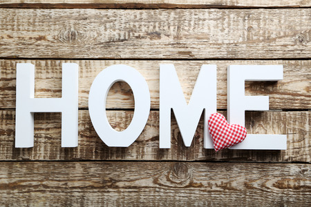 Word home of the decorative letters on wooden tableの写真素材