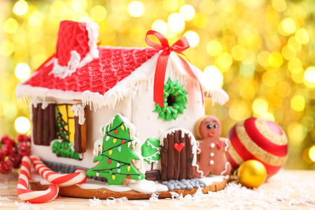 Christmas gingerbread house on lights backgroundの写真素材