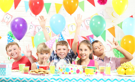 Happy childrens having fun at birthday party