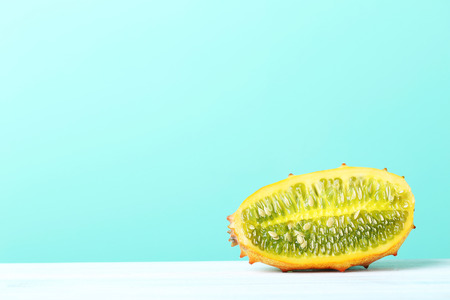 Kiwano fruit on white wooden tableの写真素材