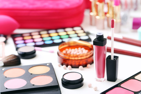 Different makeup cosmetics on white tableの写真素材