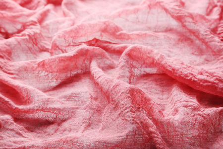 Red gauze fabric backgroundの写真素材