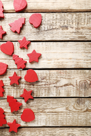 Decorative fir-tree, star and heart on brown wooden tableの写真素材