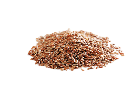 Flax seeds isolated on a whiteの写真素材