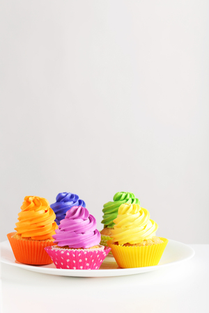 Tasty cupcakes on a white backgroundの写真素材