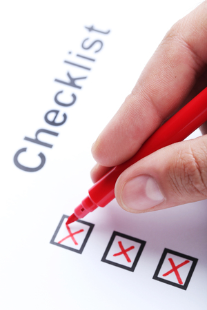 Check boxes on white paper