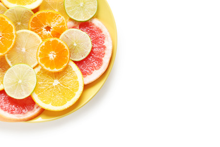 Citrus fruits on a white backgroundの写真素材