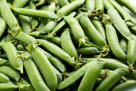 Fresh green peas background, close upの写真素材
