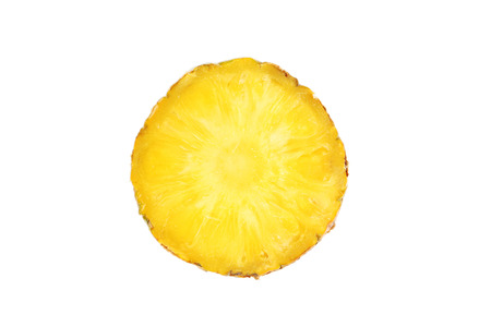 Slice of pineapple isolated on a whiteの写真素材