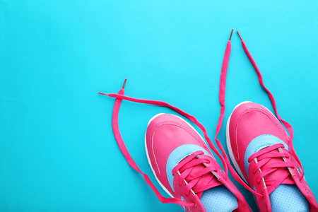 Sport shoes on blue backgroundの写真素材