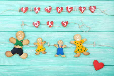 Cookies for father's day on mint wooden table