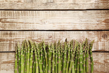 Green asparagus on grey wooden tableの写真素材