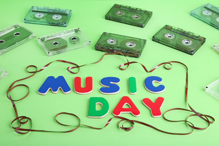 Cassette tapes with inscription Music Day on green backgroundの写真素材