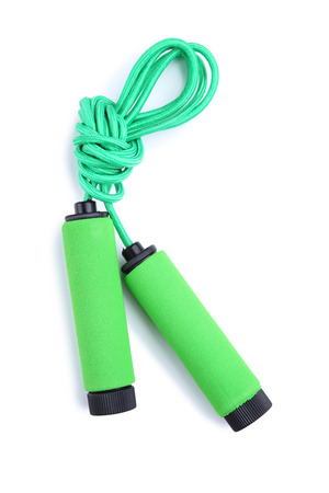 Green skipping rope isolated on a white backgroundの写真素材