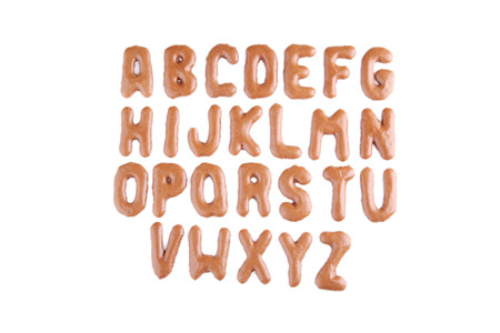 Chocolate cookies alphabet on white backgroundの写真素材