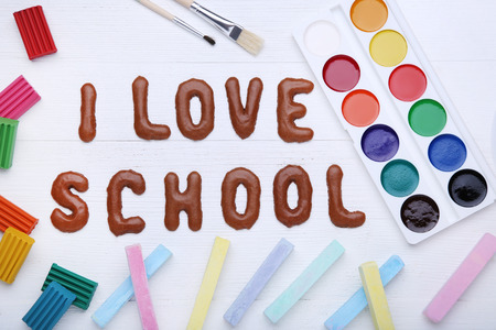 I Love School written by chocolate cookies alphabet with crayons and paintsの写真素材