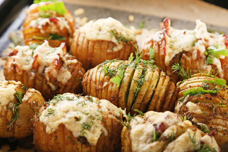 Baked potato with cheese and baconの写真素材