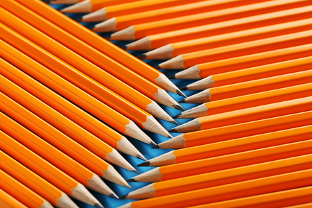 Yellow pencils on a blue backgroundの写真素材