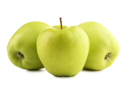 Green apples isolated on white backgroundの写真素材