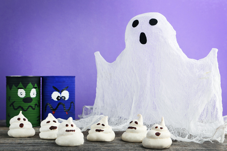 Halloween meringue with white ghost and painted jarsの写真素材