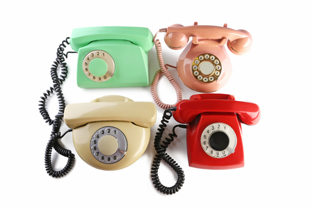 Retro telephones isolated on a whiteの写真素材