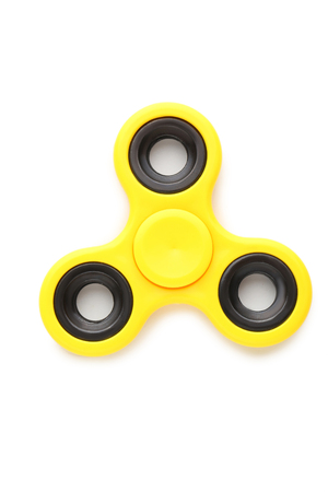 Fidget spinner toy isolated on whiteの写真素材