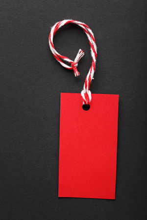 Red sale tag on black backgroundの写真素材