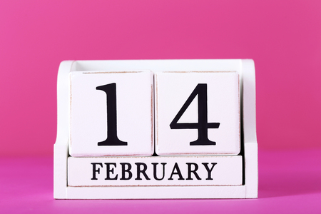 Cube calendar on a pink backgroundの写真素材