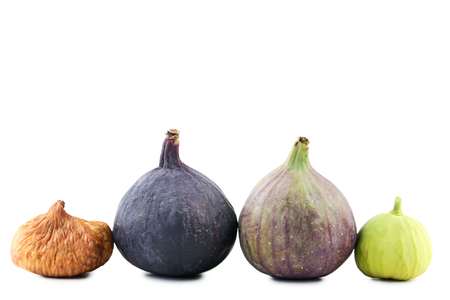 Ripe, dried and green figs isolated on whiteの写真素材
