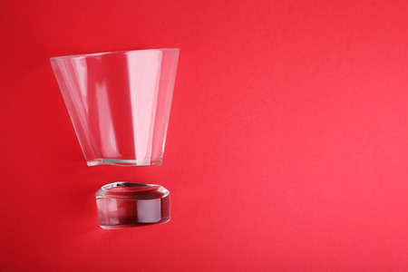 Broken glass on red backgroundの写真素材