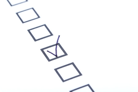 Check boxes on white paper