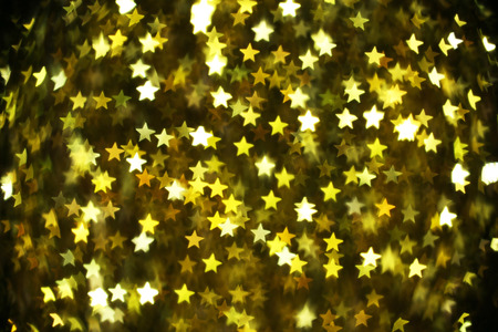 Abstract golden star bokeh background