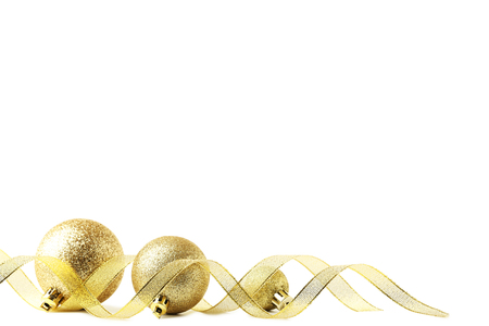 Christmas baubles with ribbon isolated on whiteの写真素材