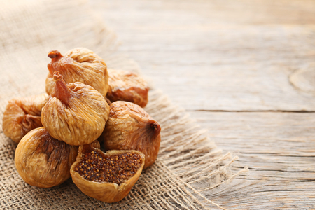Dried figs on grey wooden tableの写真素材