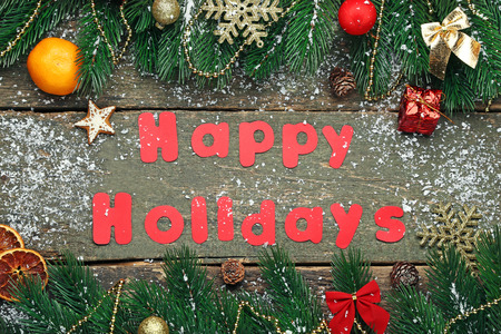 Inscription Happy Holiday with christmas decorationsの写真素材