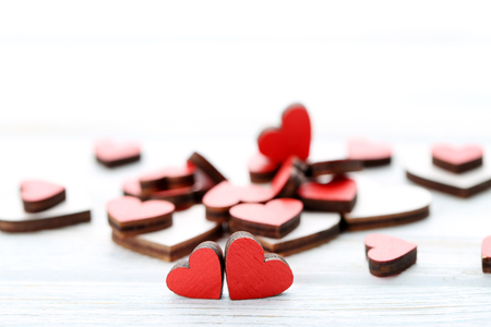 Red and white wooden heartsの写真素材