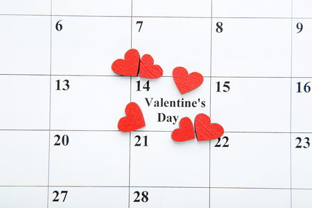 Red hearts on white february calendarの写真素材
