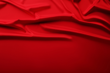 Background of red satin fabricの写真素材