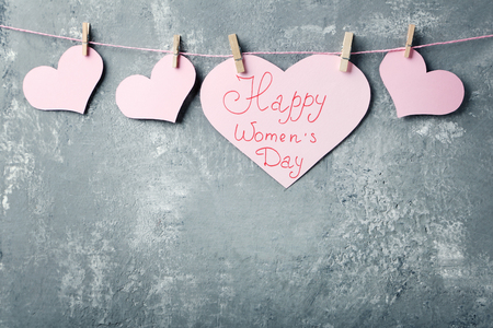 Inscription Happy women's day on pink paper heartの写真素材
