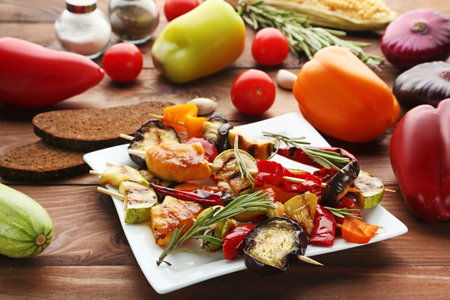 Grilled vegetable in plate on wooden tableの写真素材